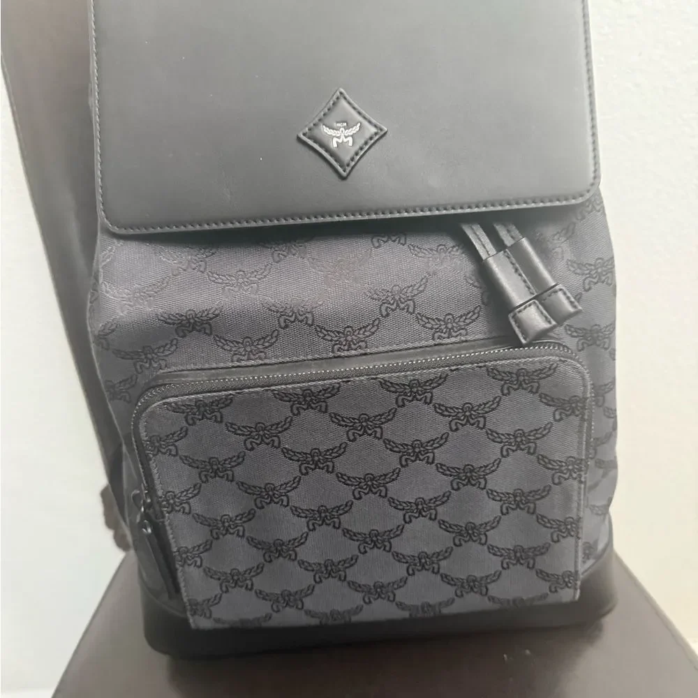Brand new Mcm Black Backpack / travel bag / diaper bag etc fits laptop